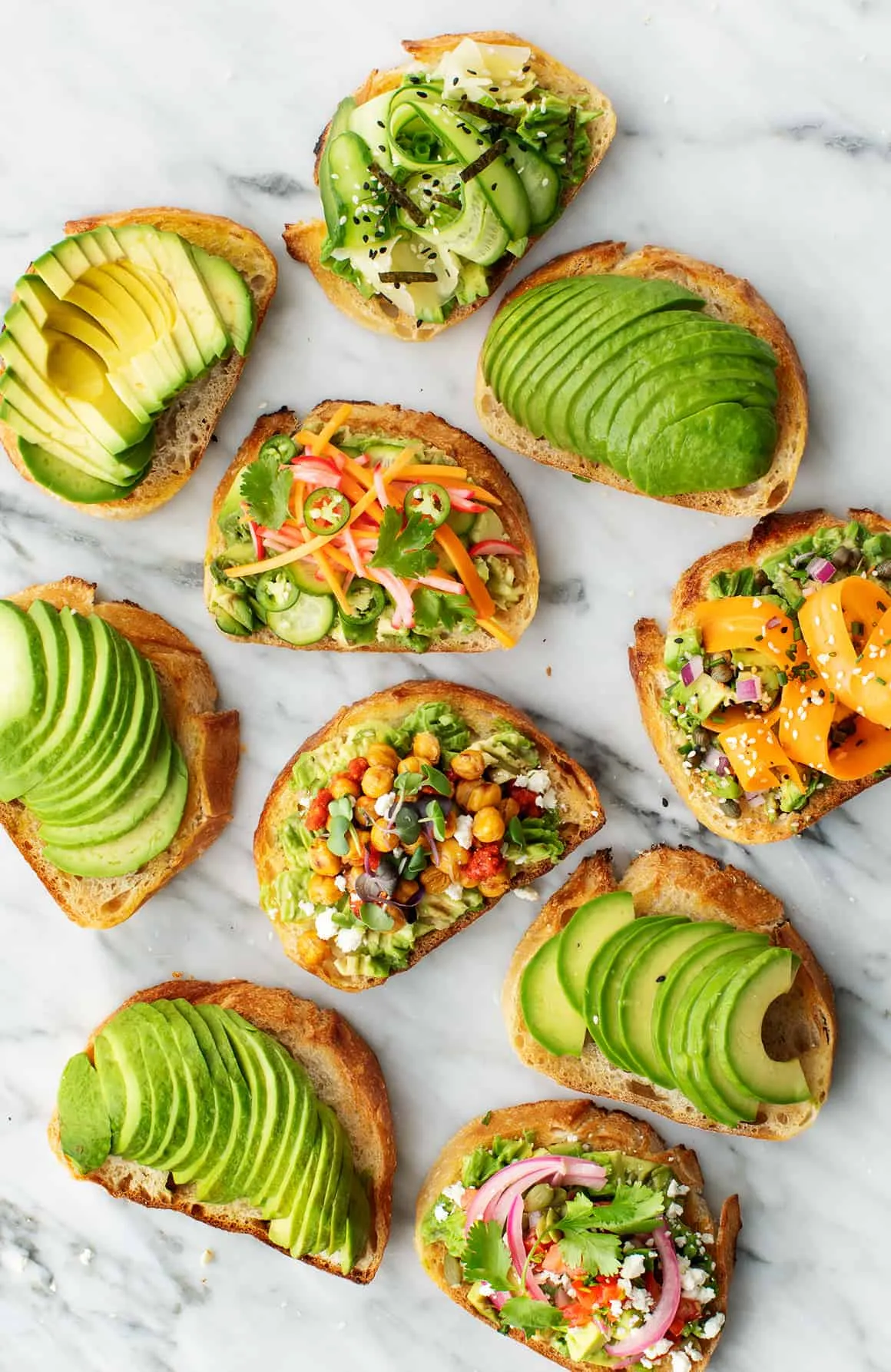 Sliced avocado on toasted sourdough bread